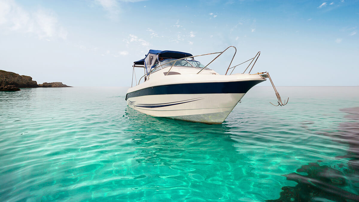 A bird's-eye view of a boat slicing through open water