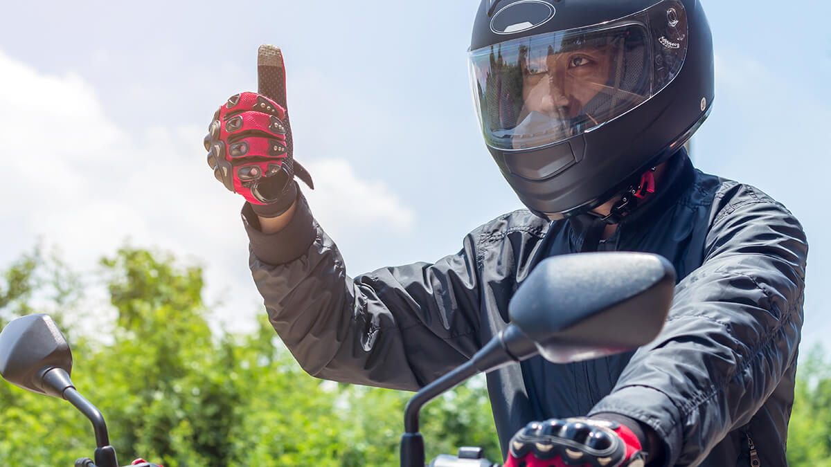 A group of motorcyclists in city traffic
