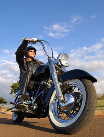 A smiling motorcycle rider